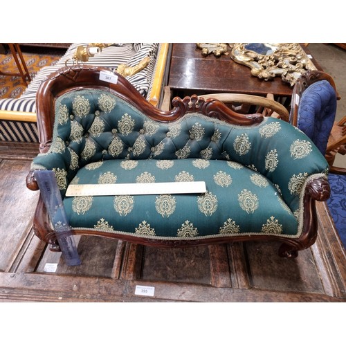 307 - A Victorian style mahogany framed Child's Chaise Longue with green button upholstery on cabriole sup... 