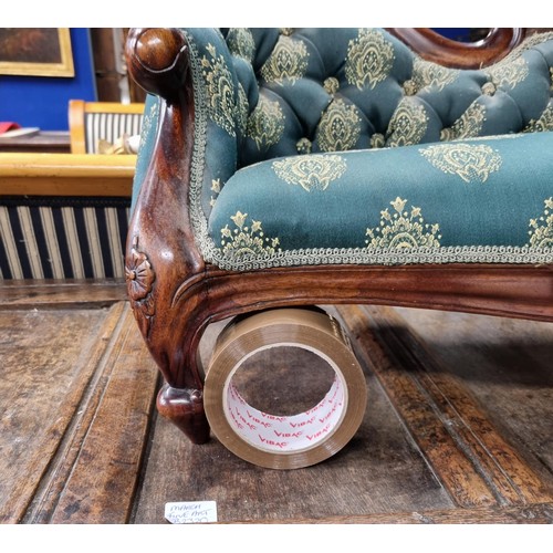 307 - A Victorian style mahogany framed Child's Chaise Longue with green button upholstery on cabriole sup... 