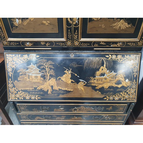 419 - A black lacquered and chinoiserie designed Bureau Bookcase having designs of figures and warriors in... 