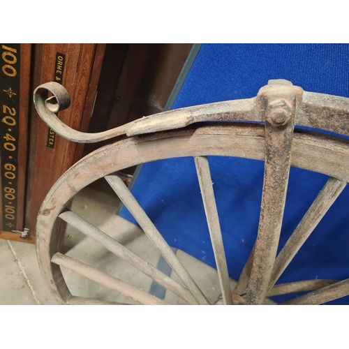 300 - A French Boneshaker Bicycle with turned wooden Handlebars, iron saddle and framework, wooden spoked ... 