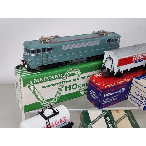 1023 - A boxed Hornby Acho 638 BB 16.000 Electric Locomotive and three boxed Wagons including 702 Primagaz,... 