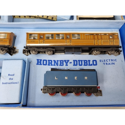 1027 - A boxed Hornby Dublo EDP1 'Sir Nigel Gresley' Passenger Set, unused, late version with sintered iron... 