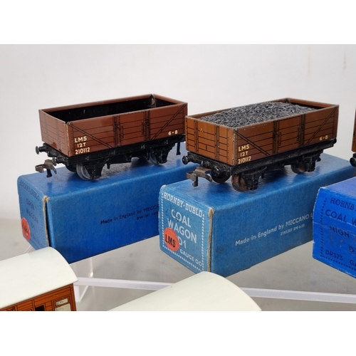 1028 - Four boxed Hornby Dublo LMS Wagons including Open Wagon, Coal Wagon, High-sided Wagon and High-sided... 