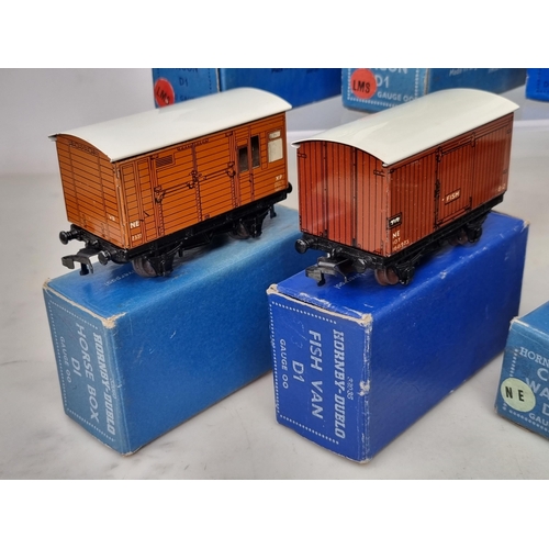 1028 - Four boxed Hornby Dublo LMS Wagons including Open Wagon, Coal Wagon, High-sided Wagon and High-sided... 