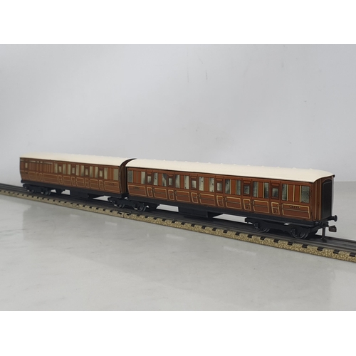 1029 - A boxed Hornby Dublo D2 LNER Articulated Coach Set, Nr M, a few small marks to edges of the roofs. B... 