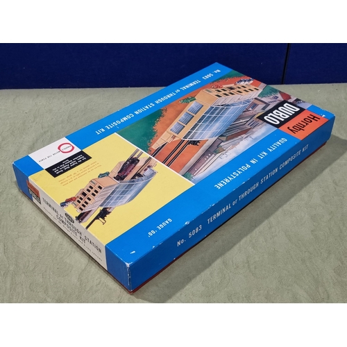 1039 - A boxed Hornby Dublo No.5083 Terminal Station, brand new models, contents in sealed bag, cardboard s... 