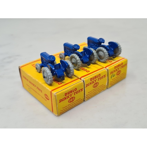 1048 - A Dublo Dinky Toys Trade Box of six 069 Massey Harris-Ferguson Tractors, M, all boxes generally Nr p... 