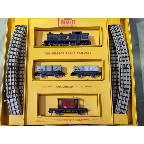 1057 - A boxed Hornby Dublo EDG16 0-6-2 Tank Goods Set, unused showing no signs of use to wheels, armature ... 