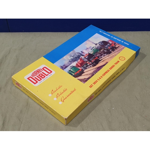 1071 - A boxed Hornby Dublo 2024 2-8-0 Freight Set, locomotive and wagons appear unused in mint condition, ... 