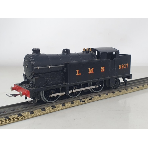 1128 - A boxed Hornby Dublo pre-war EDL7 LMS 0-6-2T, M, slight glossing to lip on water tank sides, no dama... 