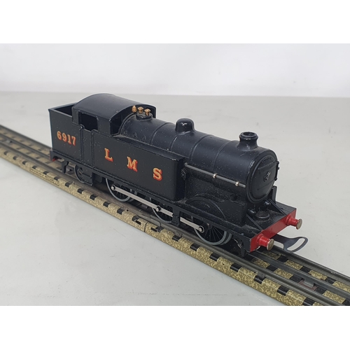 1128 - A boxed Hornby Dublo pre-war EDL7 LMS 0-6-2T, M, slight glossing to lip on water tank sides, no dama... 