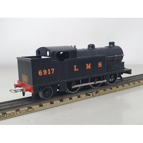 1128 - A boxed Hornby Dublo pre-war EDL7 LMS 0-6-2T, M, slight glossing to lip on water tank sides, no dama... 