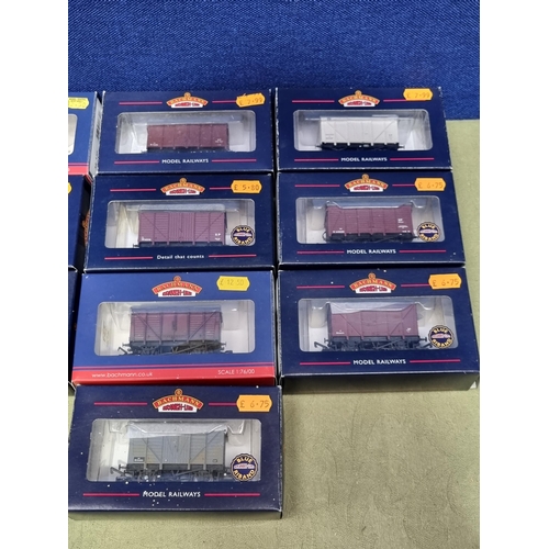 1233 - Ten boxed Bachmann 00 gauge Vans including 6x BR Ventilated, Insulated, Early BR Ventilated, SR Plyw... 