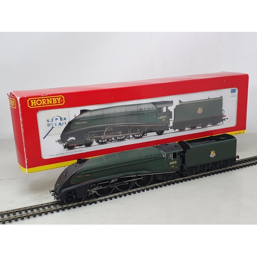 1252 - A boxed Hornby 00 gauge R2615 A4 Locomotive 'Wild Swan' in BR green livery, DCC ready, appears light... 