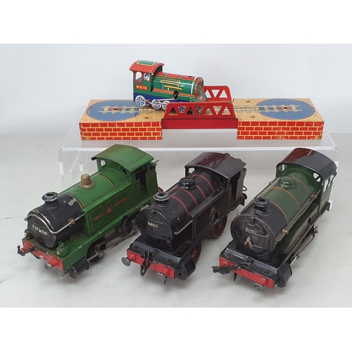 1287 - Three Hornby 0 gauge clockwork 0-4-0 Locomotives, a Platform, quantity of Track and another clockwor... 