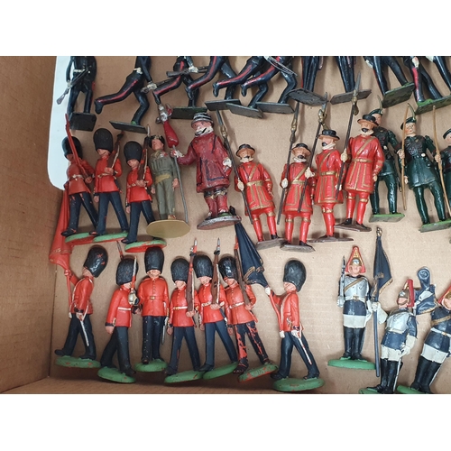 1521 - A tray of Britains plastic and diecast Military Figures including Guardsman, Royal Marines, Royal Co... 