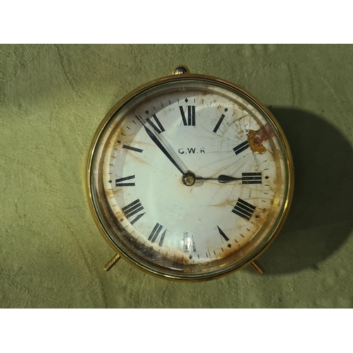 1294 - A brass cased Clock with white enamel dial with 'G.W.R.' Initials 4in D and a cast iron B.R. Shed Pl... 