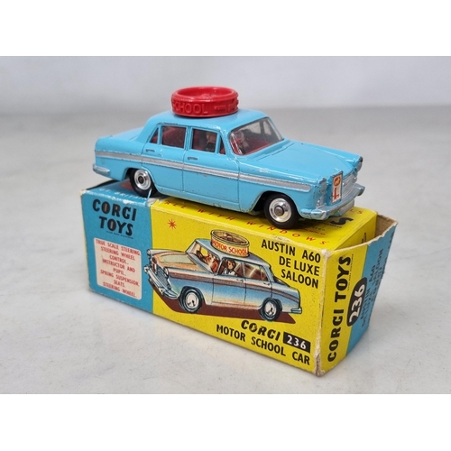 1544 - A boxed Corgi Toys No.236 Austin A60 Motor School Car,  CG, box VG