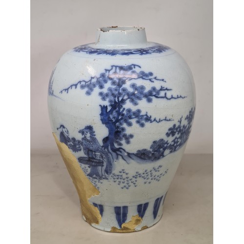 45 - A 17th Century delftware Meiping type Vase, in blue and white glaze, with Oriental landscape with fi... 