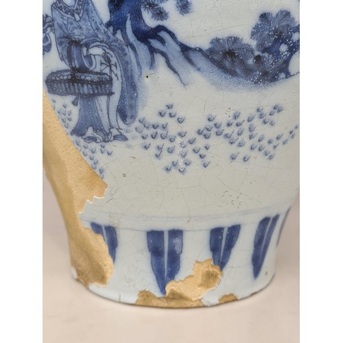45 - A 17th Century delftware Meiping type Vase, in blue and white glaze, with Oriental landscape with fi... 