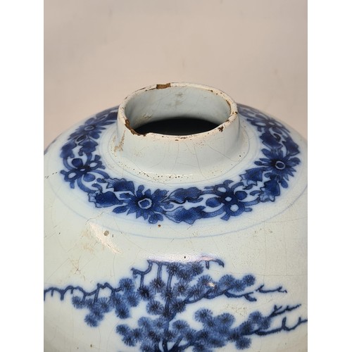 45 - A 17th Century delftware Meiping type Vase, in blue and white glaze, with Oriental landscape with fi... 