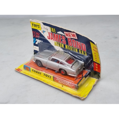 1553 - A boxed Corgi Toys No.270 James Bond Aston Martin DB5 with secret instructions, instructions and sti... 