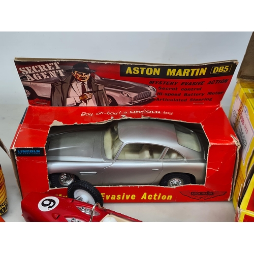 1564 - A boxed Lincoln International James Bond Mystery Avasive Action Aston Martin DB5 (body not screwed t... 