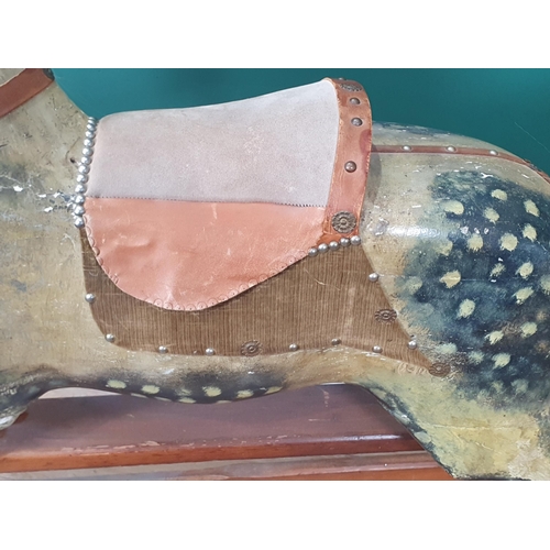 49 - A Victorian carved and painted dapple gray Rocking Horse in the manner of F.H. Ayres, with leather b... 