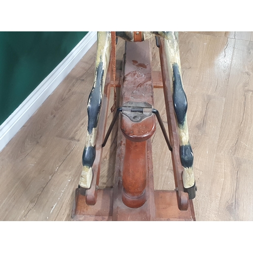 49 - A Victorian carved and painted dapple gray Rocking Horse in the manner of F.H. Ayres, with leather b... 