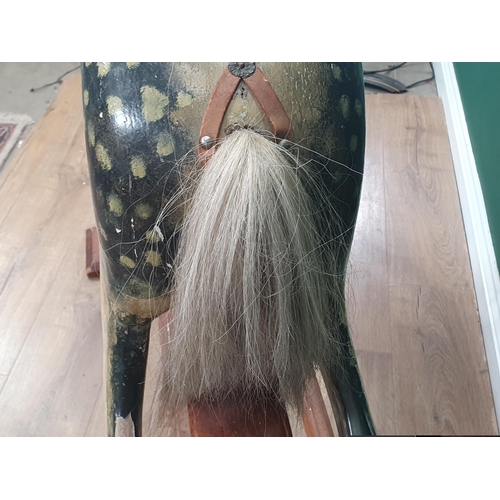 49 - A Victorian carved and painted dapple gray Rocking Horse in the manner of F.H. Ayres, with leather b... 