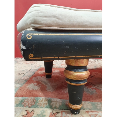 18 - A cream button upholstered miniature Chaise Longue/Day Bed, the painted frame with gilt floral and s... 