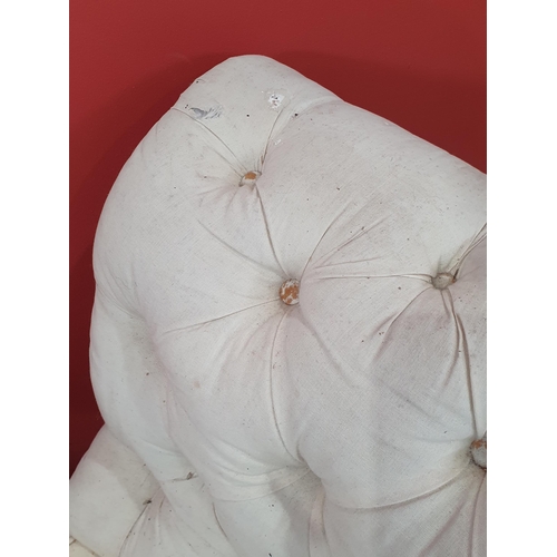 18 - A cream button upholstered miniature Chaise Longue/Day Bed, the painted frame with gilt floral and s... 