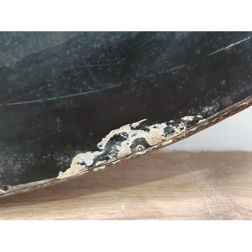 24 - An oval copper framed Wall Mirror with applied shell type roundel decorations with bevelled plate, b... 