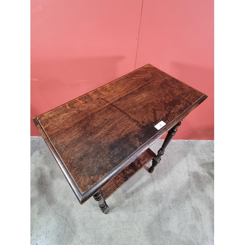 48 - An oak two-tier Stand, with moulded top, raised on turned supports, 42in H x 27in W x 15in D, (R3)