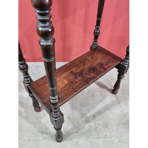 48 - An oak two-tier Stand, with moulded top, raised on turned supports, 42in H x 27in W x 15in D, (R3)