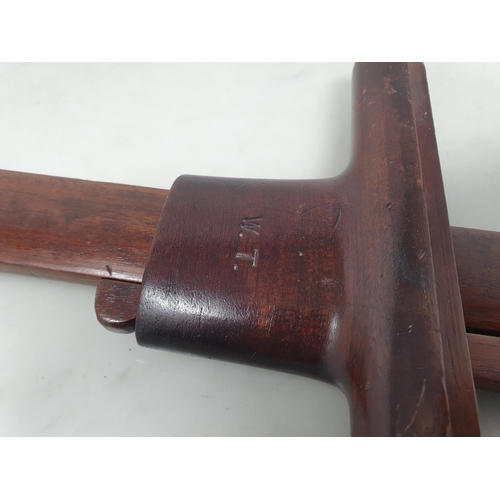 56 - A Carpenter's mahogany adjustable T Bar/Clamp with brass mount for pin, and engraved initials W.T (R... 