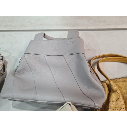 73 - A red leather Handbag by Radley London, and six other leather Handbags by Radley, Demellier, etc (R3... 