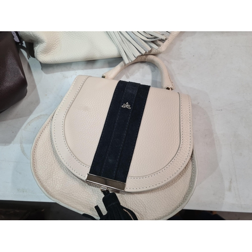 73 - A red leather Handbag by Radley London, and six other leather Handbags by Radley, Demellier, etc (R3... 