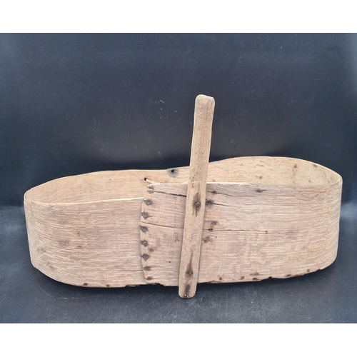 76 - An antique primitive folk art bent oak and elm Seed or Feed Spreader of kidney shape with rustic han... 