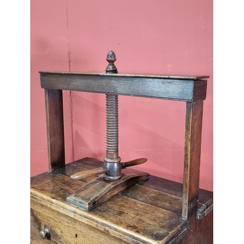 8 - A 19th Century oak Book Press Chest with three long drawers, raised on shaped bracket supports, 4ft ... 