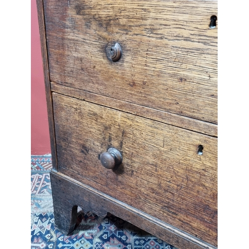 8 - A 19th Century oak Book Press Chest with three long drawers, raised on shaped bracket supports, 4ft ... 