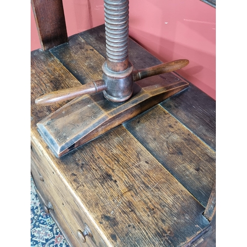 8 - A 19th Century oak Book Press Chest with three long drawers, raised on shaped bracket supports, 4ft ... 