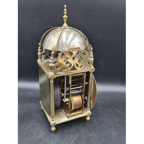 82 - A 17th century style brass cased Lantern Type Clock with circular dial inscribed Will'm Mayhem, Wood... 