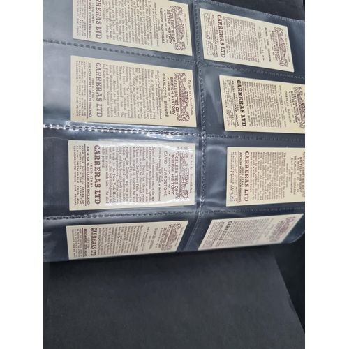 96 - A green Album containing Sets of Cigarette Cards including dogs, birds, historians, paintings, kings... 