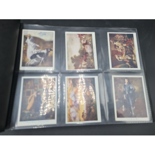 96 - A green Album containing Sets of Cigarette Cards including dogs, birds, historians, paintings, kings... 