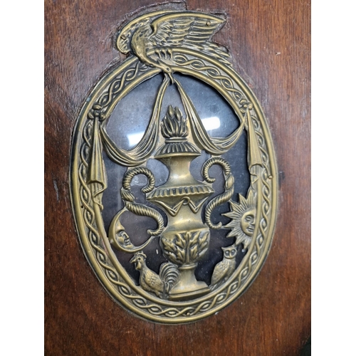 26 - A Dutch oak cased Wall Clock with painted arched dial depicting fishing scenes with figural decorati... 