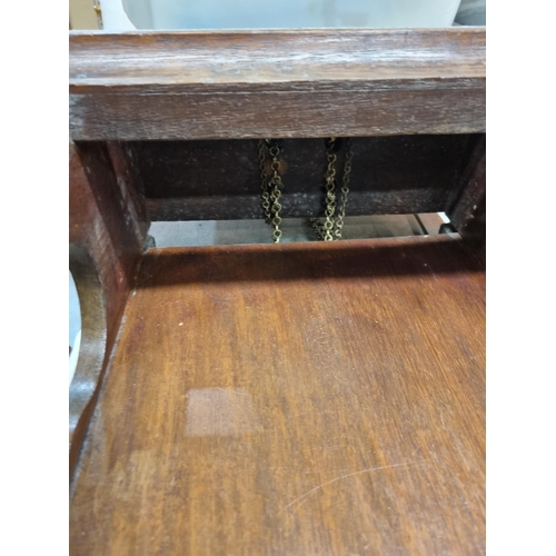 26 - A Dutch oak cased Wall Clock with painted arched dial depicting fishing scenes with figural decorati... 