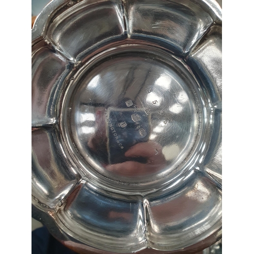 97 - A quantity of plated items including a four piece Tea Service, a Teapot, a Milk Jug, a two-handled r... 