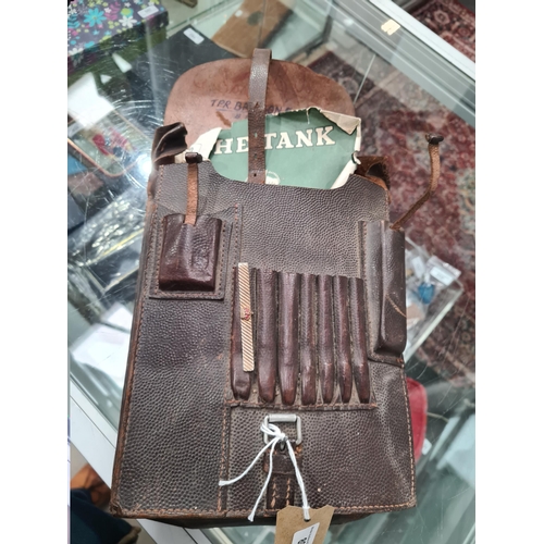 89 - A leather military Map/Document Case, brass buckles, badges etc, (R2)