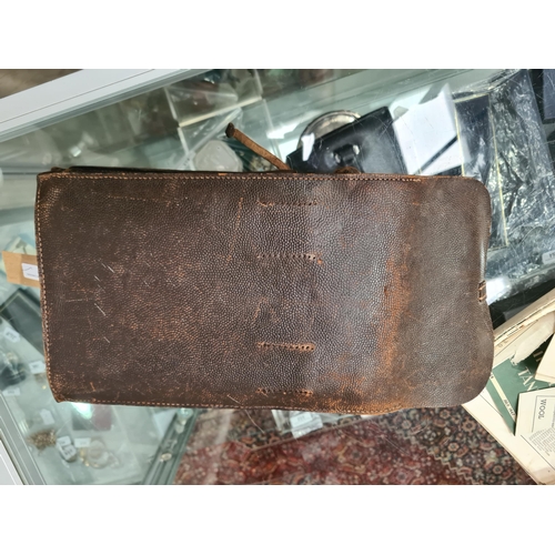 89 - A leather military Map/Document Case, brass buckles, badges etc, (R2)